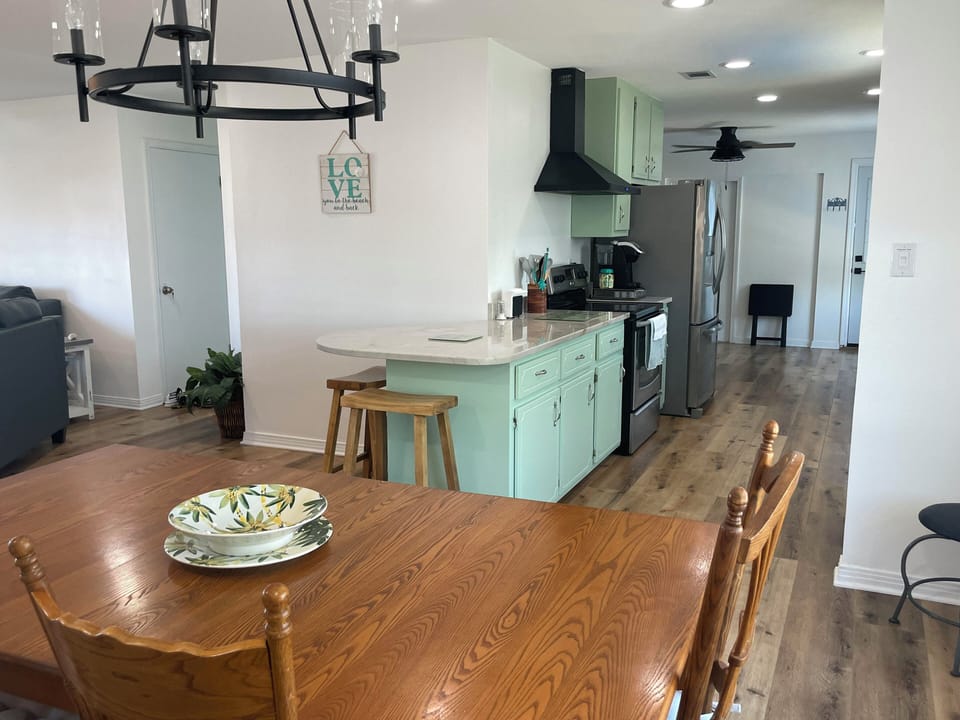 Open floor plan from kitchen to dining room to living room