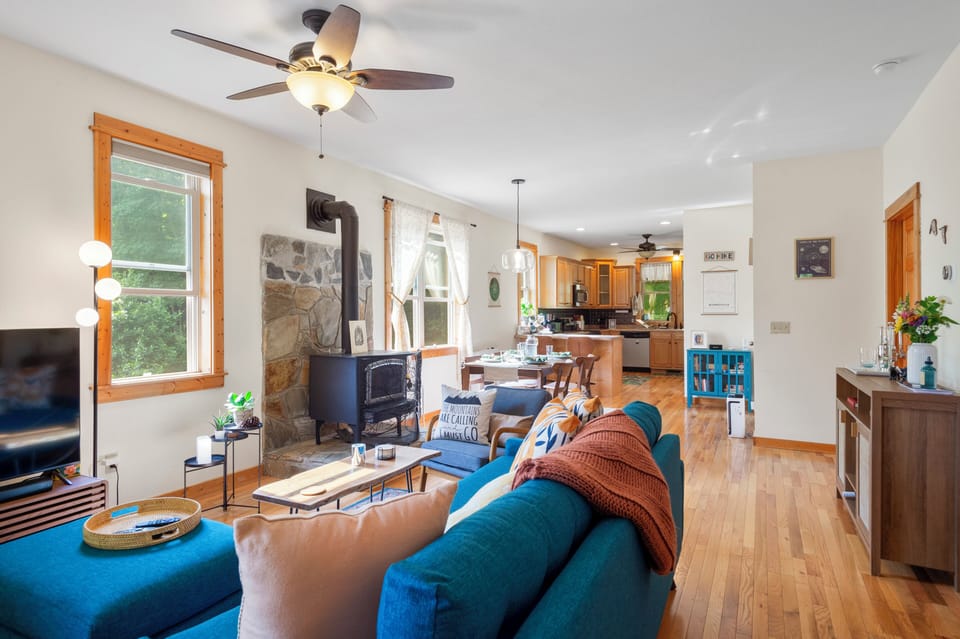 The spacious living/ dining area is bright and welcoming