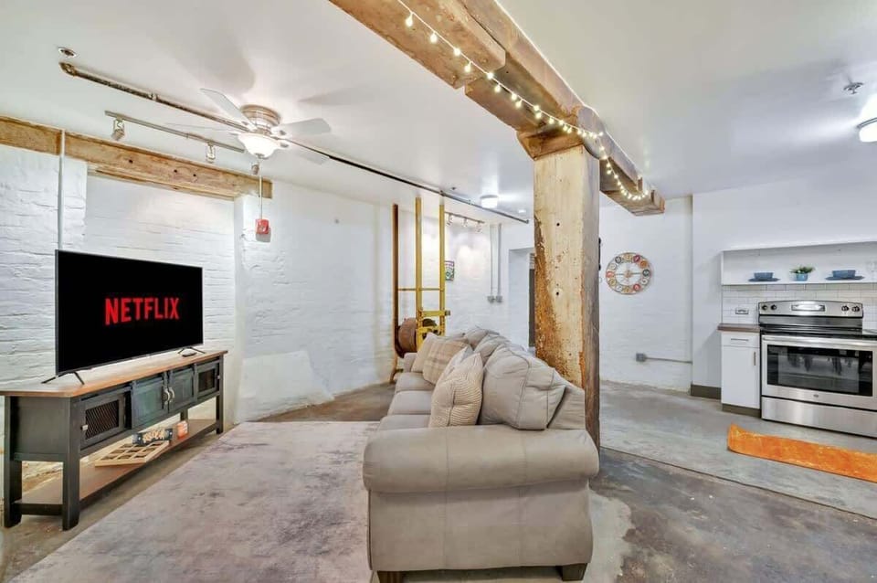 Queen Pullout couch -located in the open concept living room