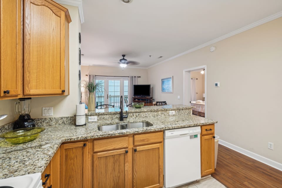 Extended view from kitchen to dining & living area.