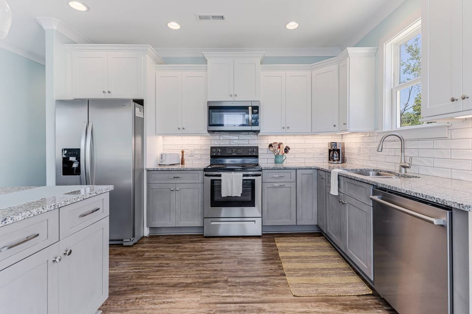 Enjoy the well-stocked kitchen, complete with a refrigerator, stove, microwave, and coffee maker.