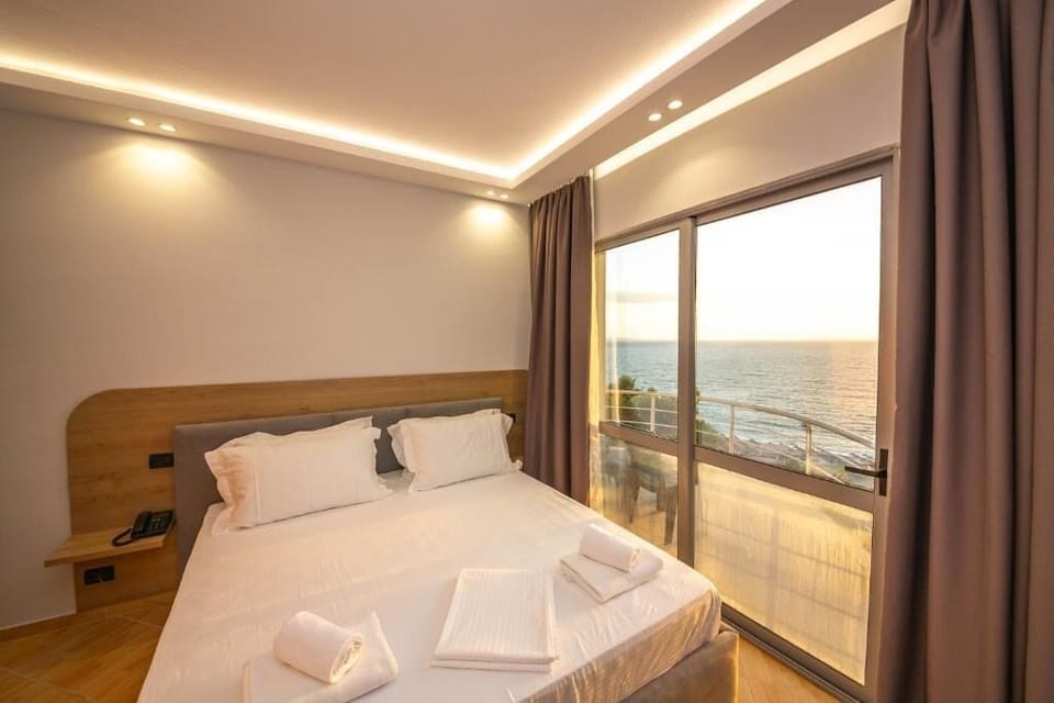 Deluxe Double Room, Balcony, Sea View | In-room safe, desk, blackout drapes, WiFi (free)