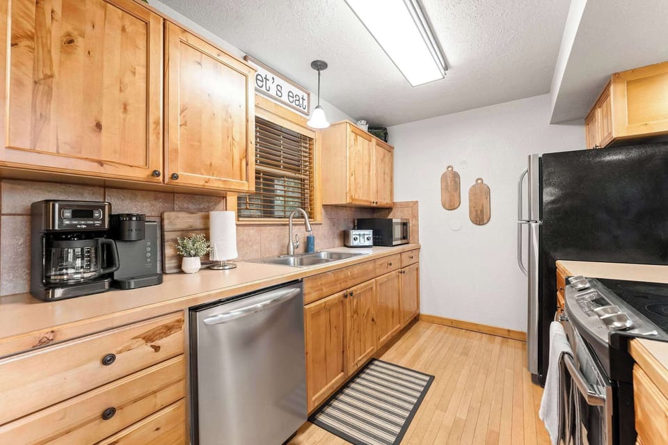 The kitchen is equipped with all the essentials; dishwasher, fridge, oven, etc.