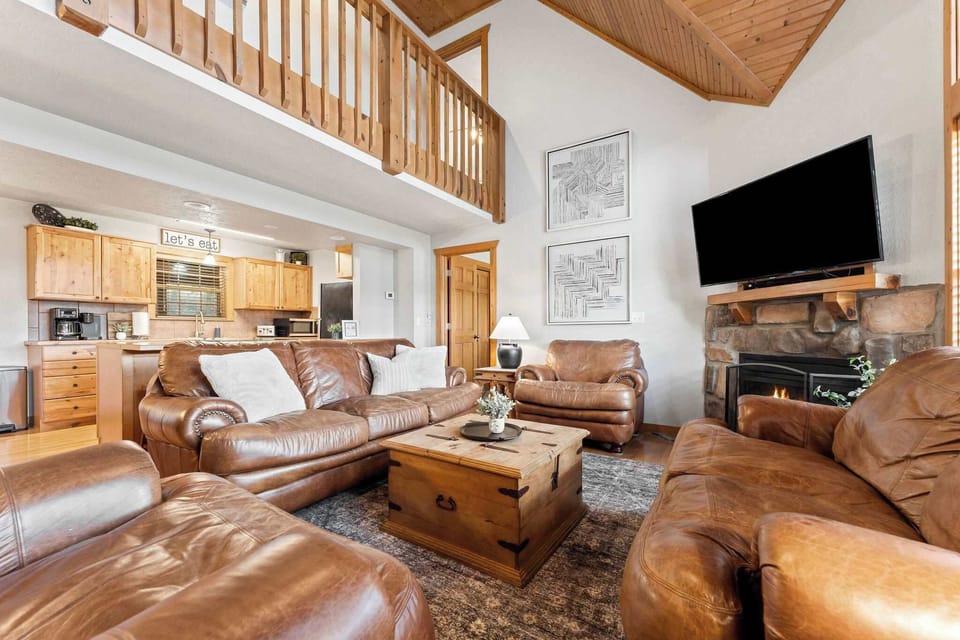 Lots of seating and a large TV make this a great gathering place for all!