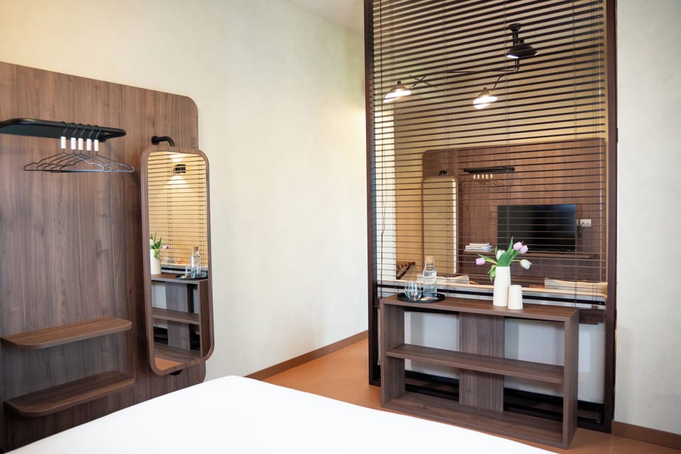 Deluxe Quadruple Room, Balcony, Park View | Soundproofing, iron/ironing board, free WiFi