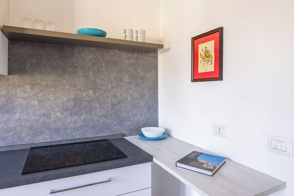 City Apartment, Balcony | Private kitchen | Dining tables