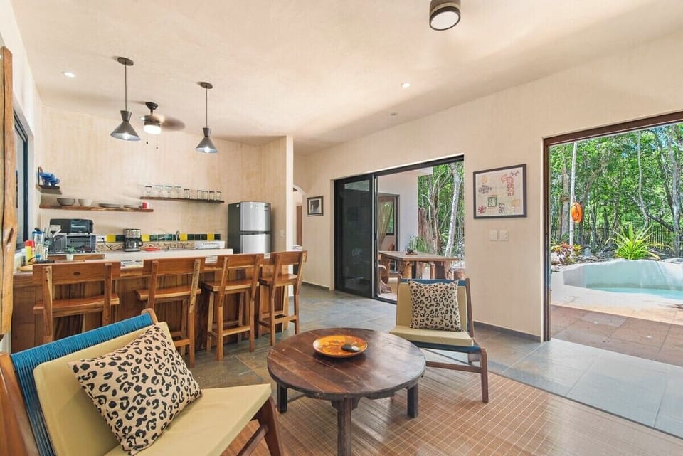 Ground floor living room, looking out onto the pool