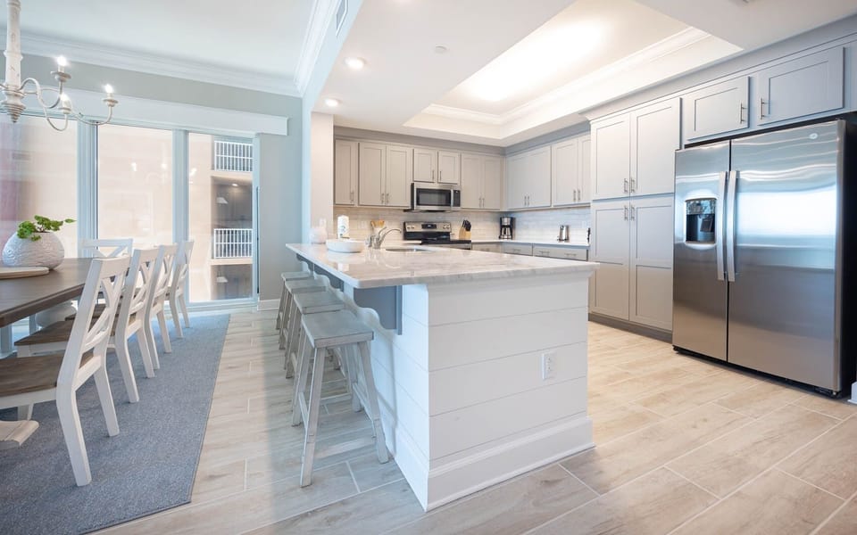 Condo, 4 Bedrooms | Private kitchen | Fridge, oven, coffee/tea maker