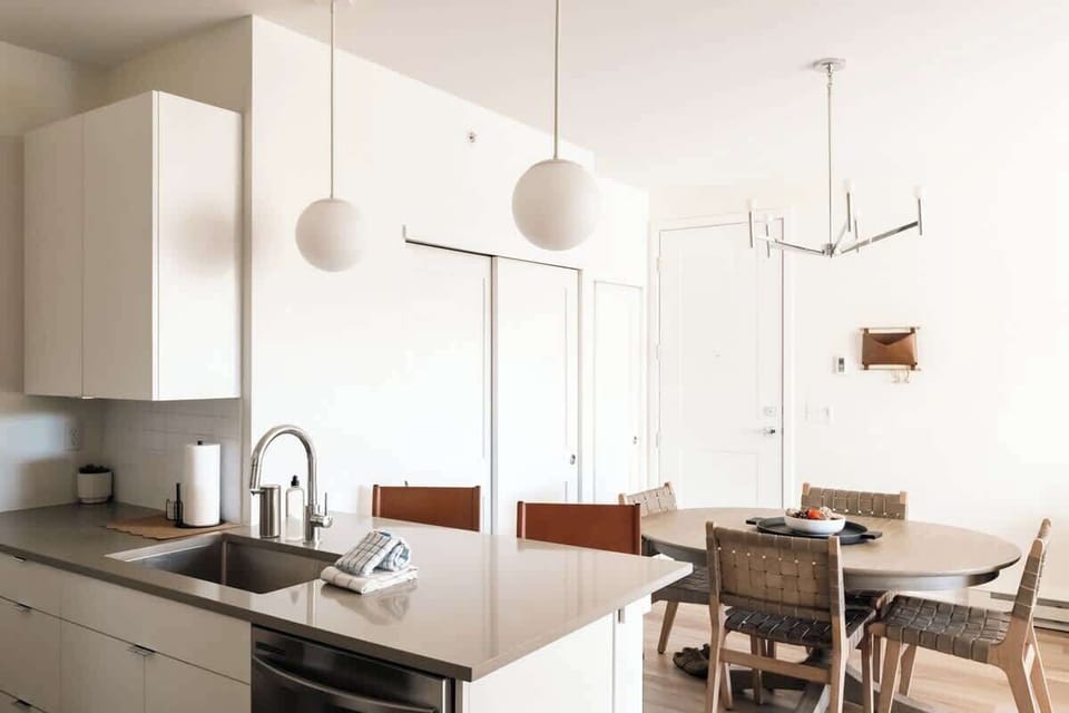 Kitchen counter seating and laundry closet