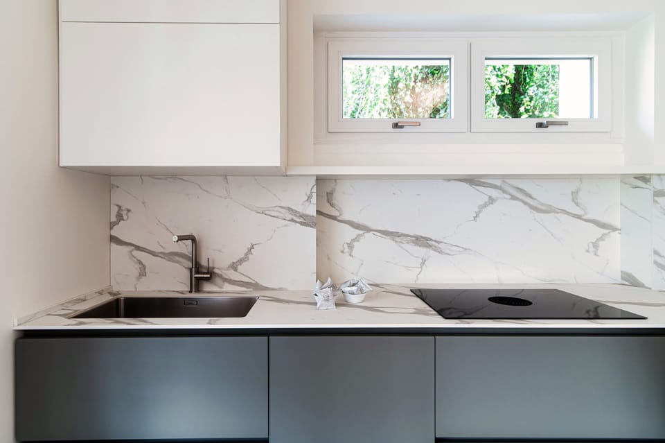 Apartment, Patio, City View | Private kitchen | Full-size fridge, oven, stovetop, dishwasher