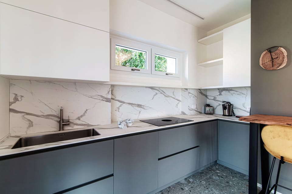Apartment, Patio, City View | Private kitchen | Full-size fridge, oven, stovetop, dishwasher