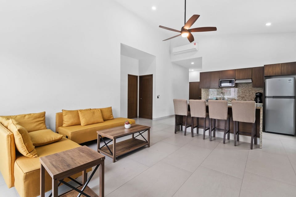 Presidential Chalet | Living area | 50-inch flat-screen TV with cable channels