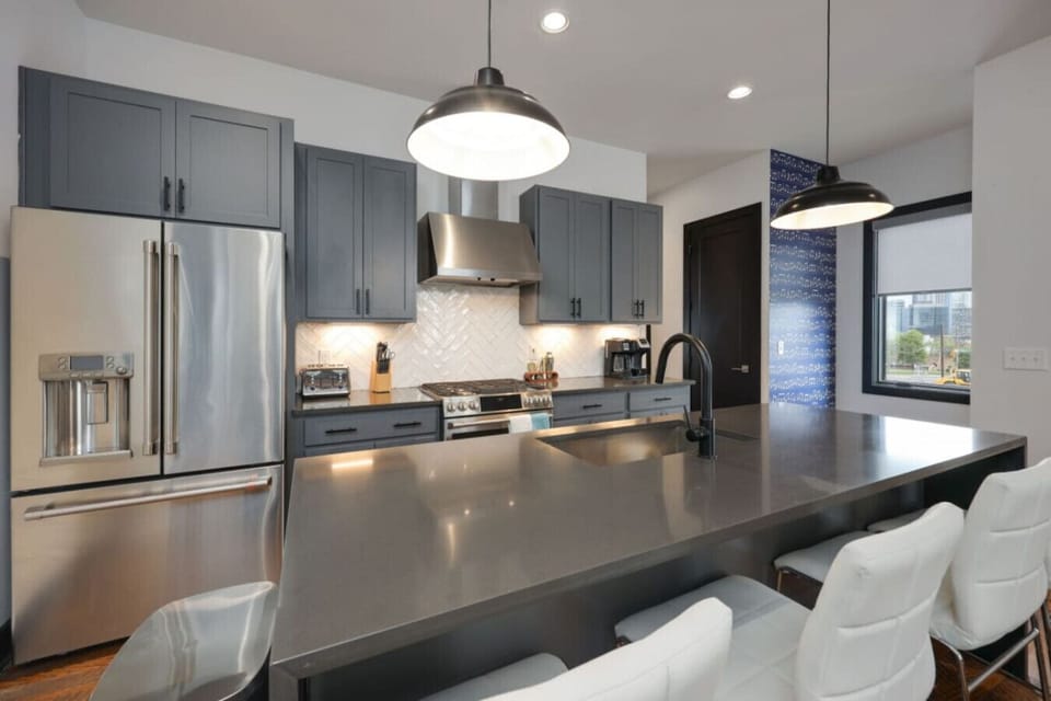 A loft or upper room with abundant natural light offers extra space and a relaxed vibe.