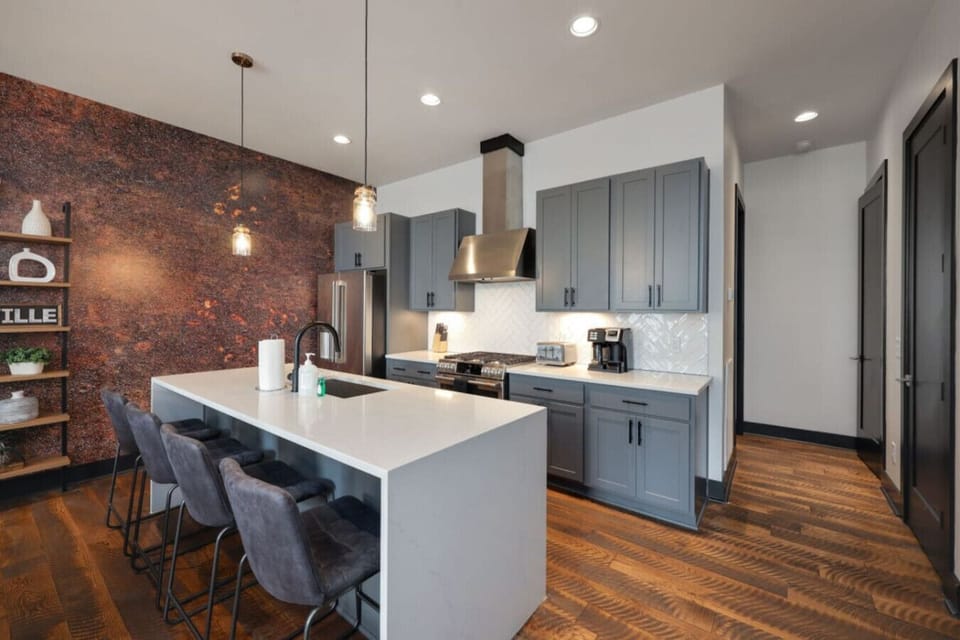 The dining area features unique music wall art and plenty of room for the whole group.