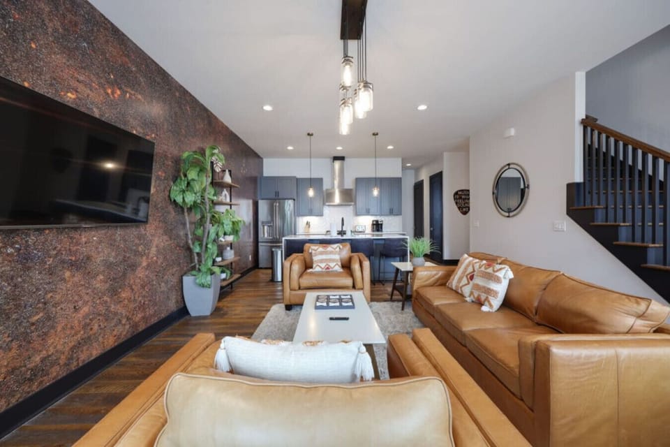 The spacious open-concept living area is designed for comfortable group stays.