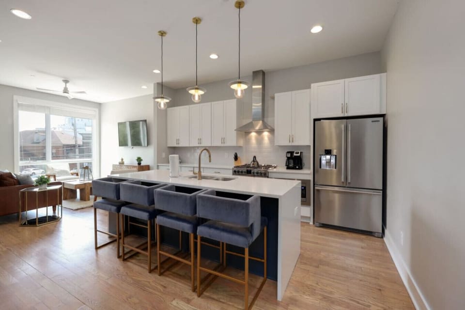 Open floor plan showing dining area, kitchen, and living space