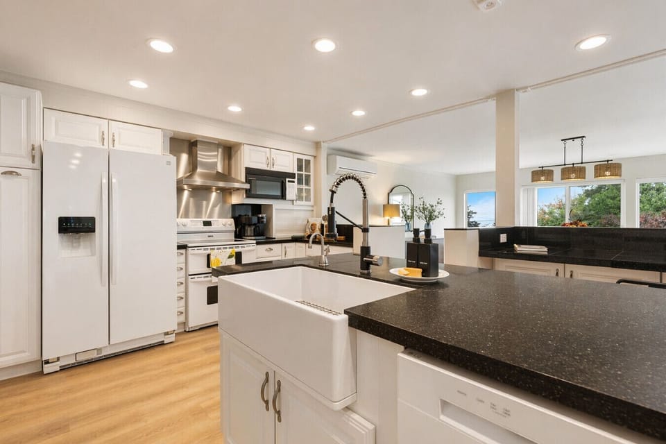Chefs kitchen w/ Modern Appliances & Large Sink