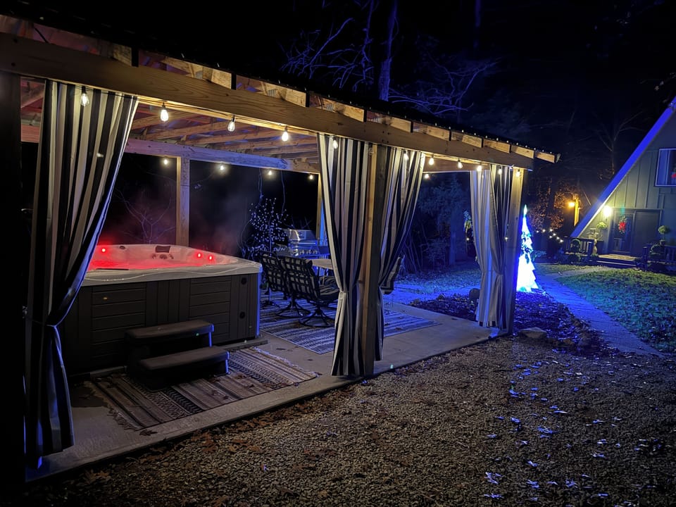 Covered hot tub house for all season hot tub use, just steps aways for the lodge