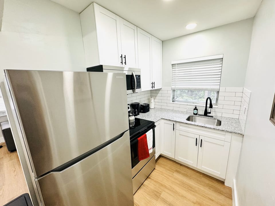 Fully Equipped kitchen ready to bring your inner chef out. New appliances ready to cook all sorts of meal.