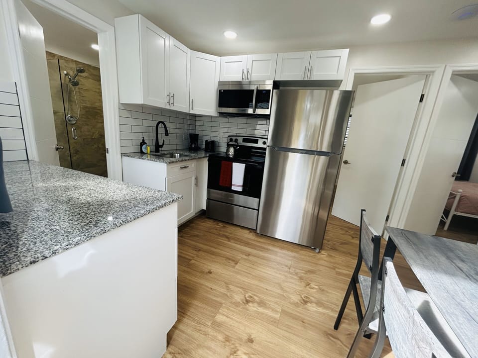 Embark on culinary adventures in our modern kitchen—a space where functionality meets style. Explore the joy of cooking surrounded by sleek design and contemporary amenities.