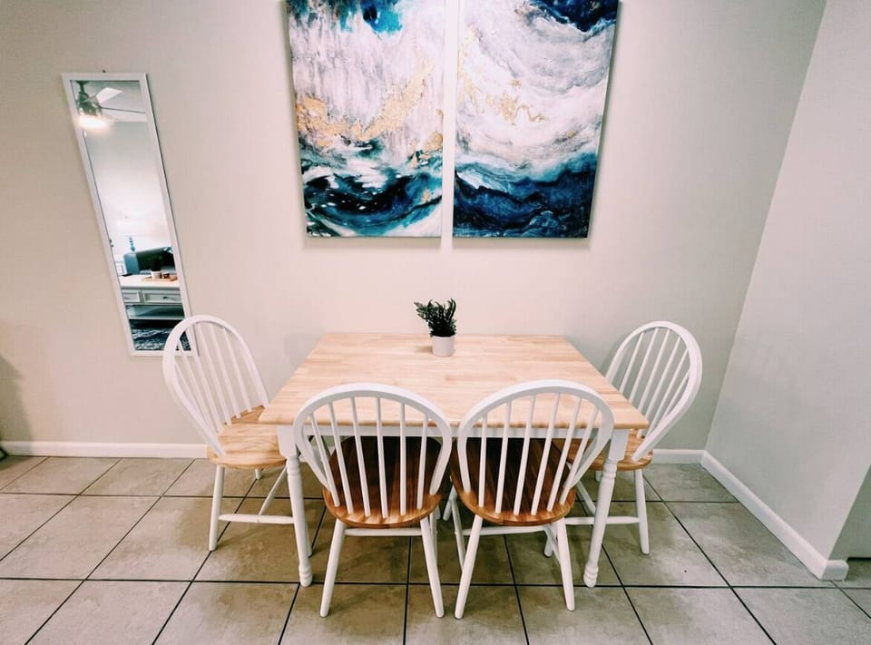 Living Room

Sun-drench living area equipped with a comfortable leatherette sofa bed, coastal vibes, a work desk, 50" smart TV, and a dining table for 4 people. Free Wi-Fi is included to work and watch your favorite streaming services. 