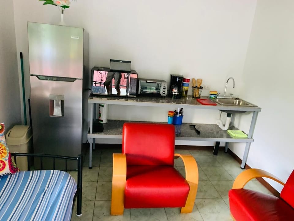 Refrigerator, toaster, coffee maker, micro and basic utensils provided.