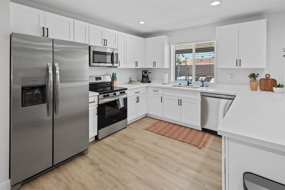 Kitchen with Refrigerator, Microwave, Stove, and Dishwasher
