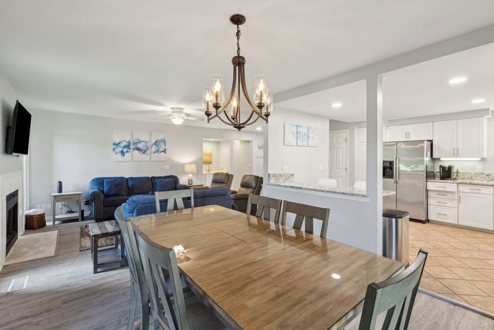The open-concept living and dining area ensures that everyone in the group stays included in conversation and admires the culinary adventures of the chief among you.