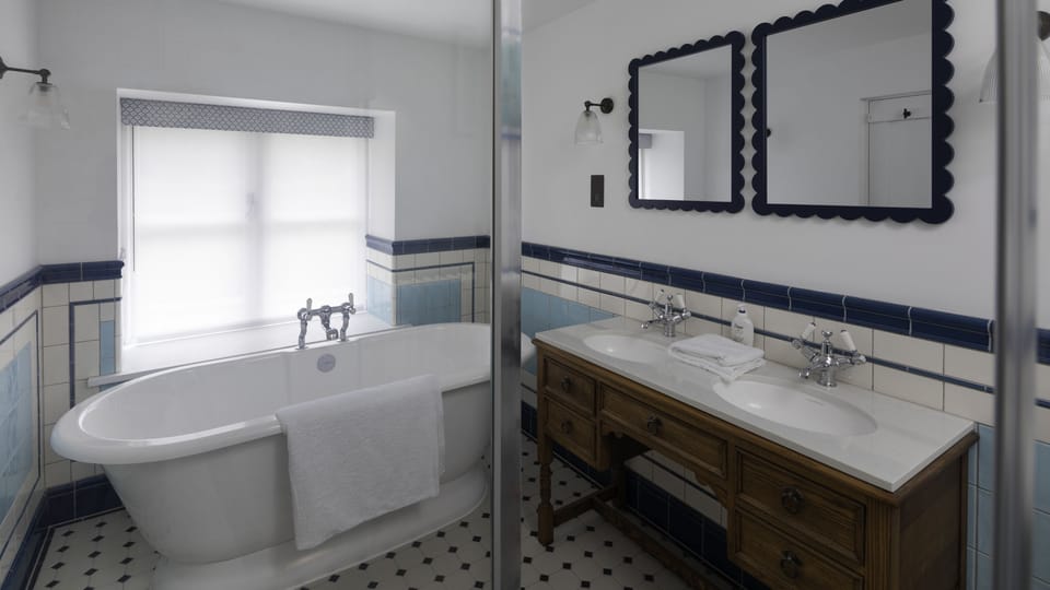 Upper Lodge's master bedroom en-suite exudes style
