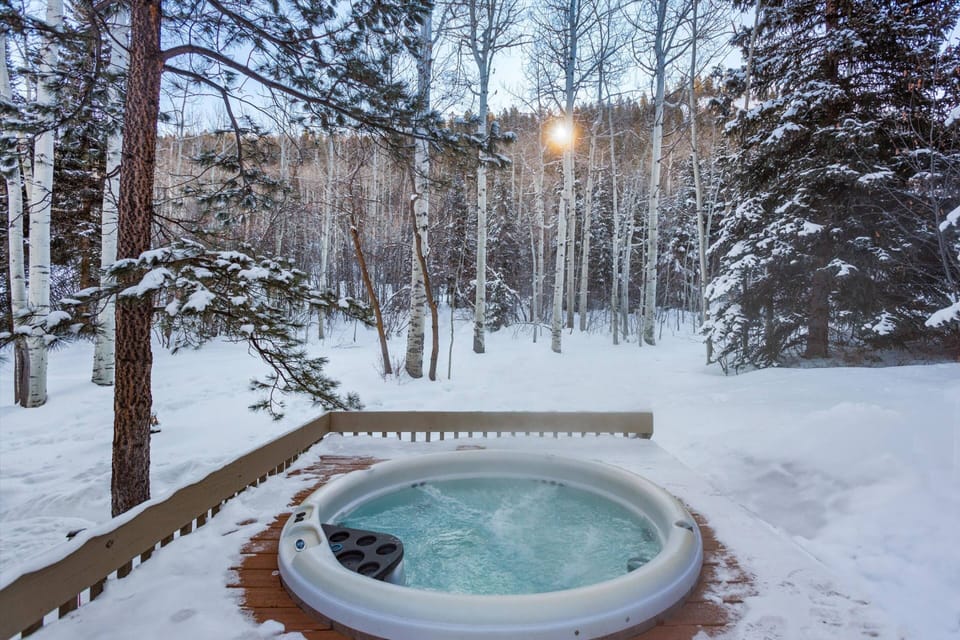 Soak in the private hot tub after a day on the slopes!