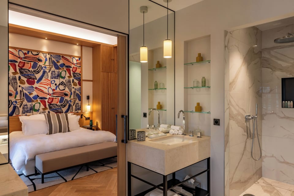 Deluxe Double Room, Lake View | Bathroom | Separate tub and shower, designer toiletries, hair dryer, bathrobes
