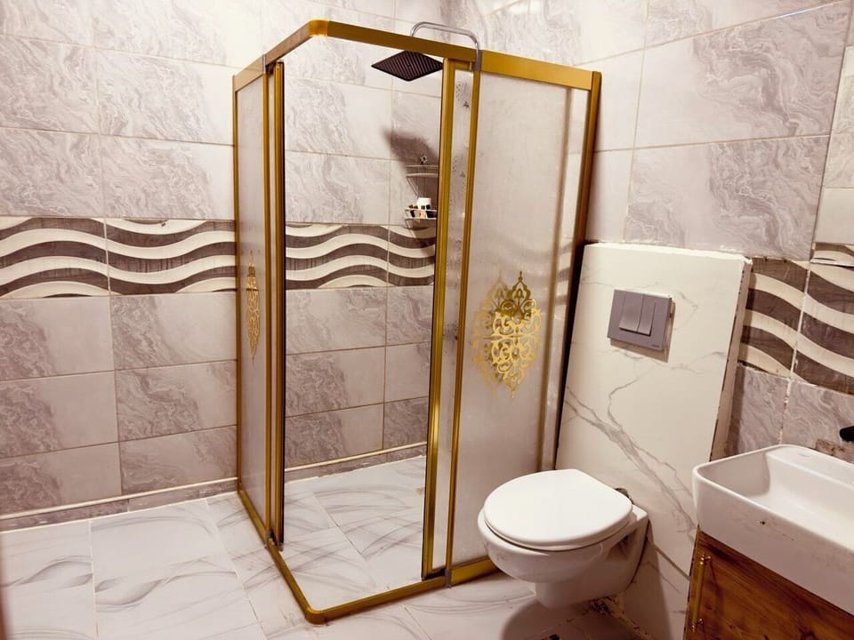 Deluxe Double Room, City View | Bathroom | Shower, hair dryer, bathrobes, slippers