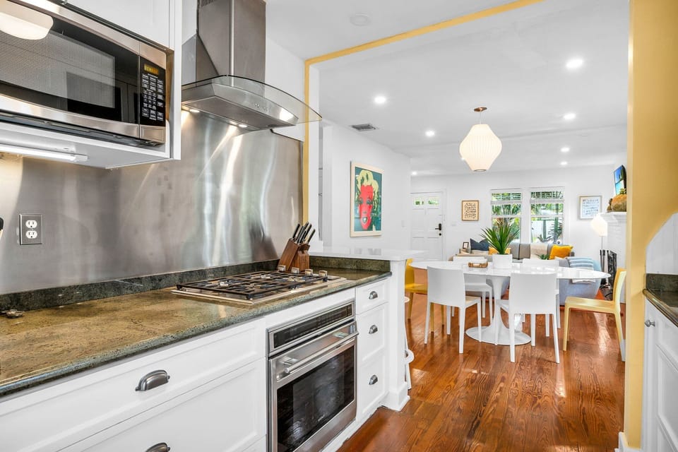 Fully stocked with everything you need, including a gas-range stove, oven, blender, service for 12, coffee maker, and more for culinary enthusiasts.