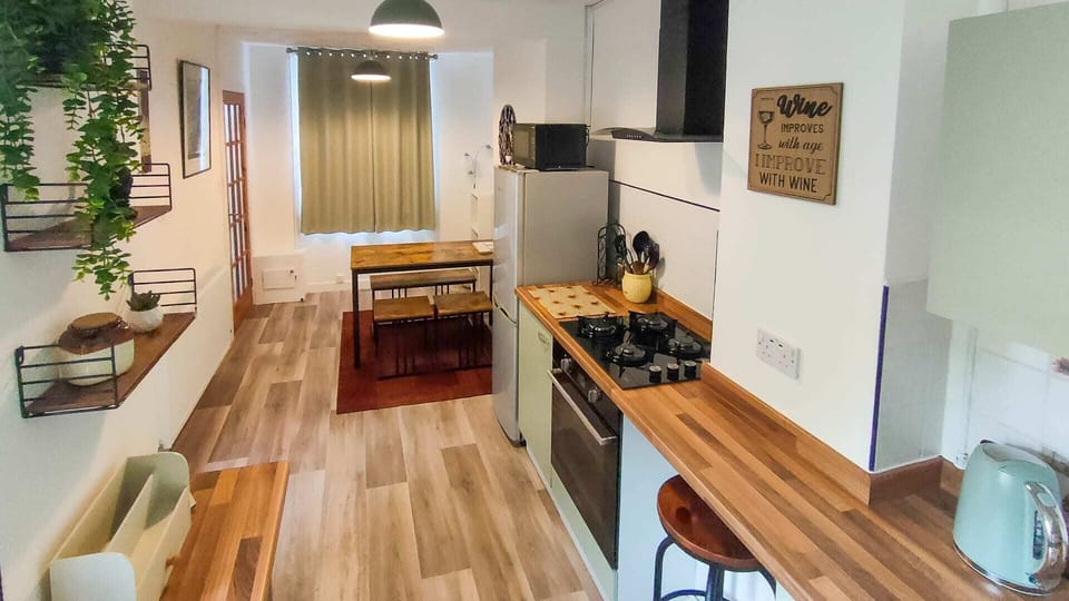 Fridge microwave kettle well equipped kitchen