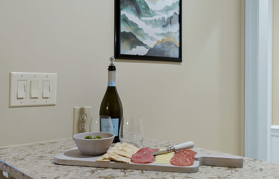 Wine bottle and charcuterie