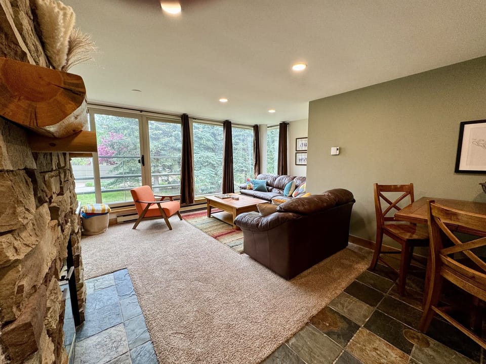 Open floor plan, Kitchen, dining room and living room open up to large windows