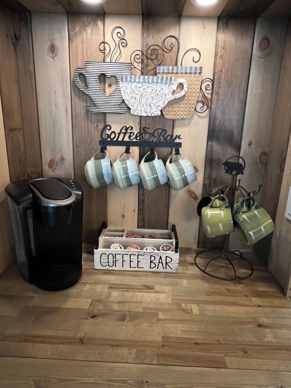 Keurig Coffee maker, a variety of coffees, creamers and sweeteners are provided.