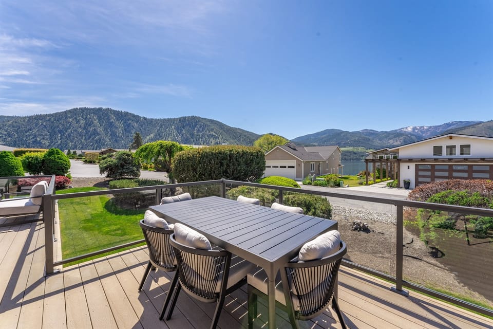 Outdoor dining with stunning views of lake and mountains