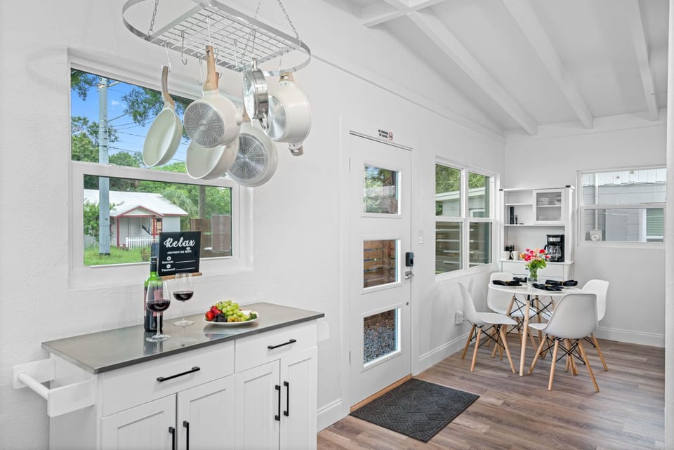 The careful selection of furniture, lighting, and decor creates an inviting atmosphere that is perfect for enjoying meals and making memories with family and friends.