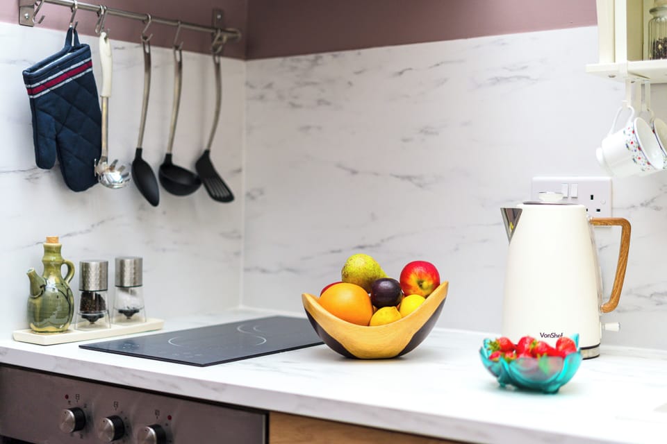 Luxury Studio Suite | Private kitchen | Full-size fridge, oven, stovetop, espresso maker