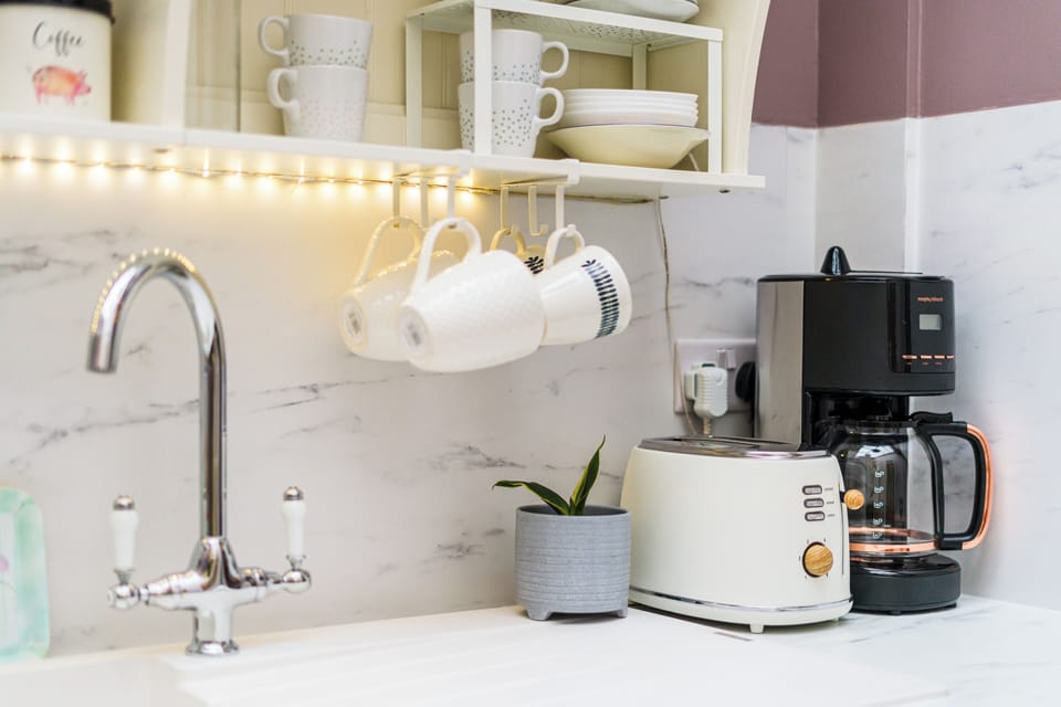 Full-size fridge, oven, stovetop, espresso maker