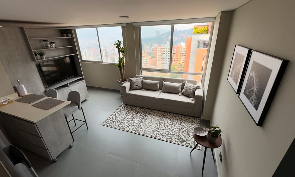 Comfort Apartment, City View | Living area | TV