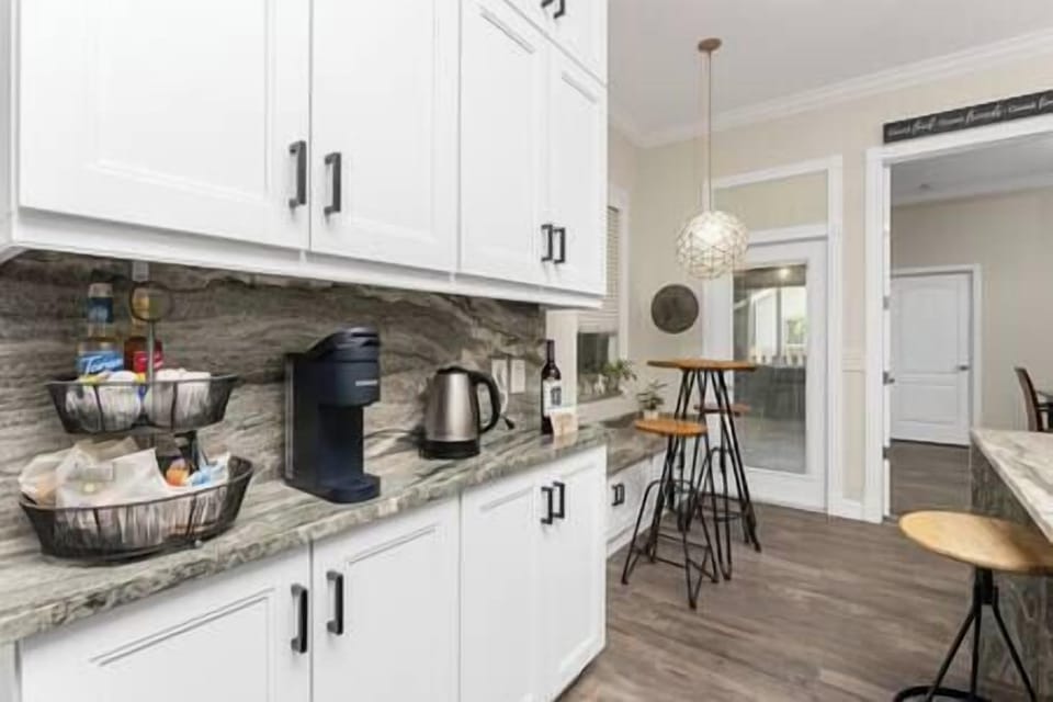 Start your day off right with the fully stocked coffee and tea bar.