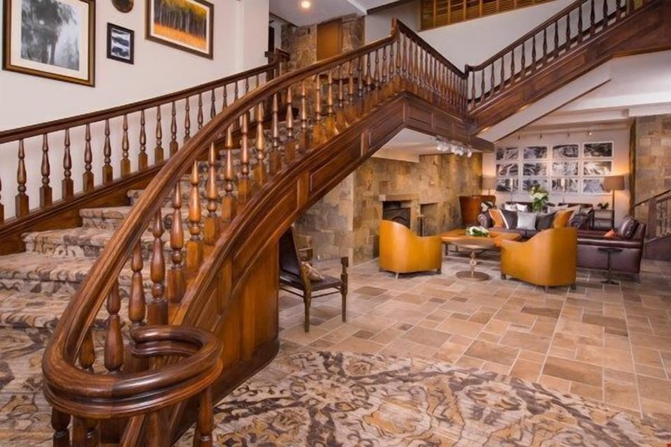 The lobby boasts gorgeous wood-panelling and cozy decor.