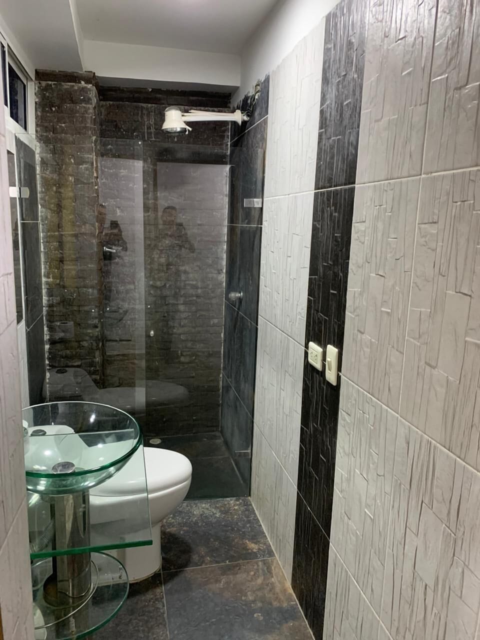 Shower, towels, soap, toilet paper