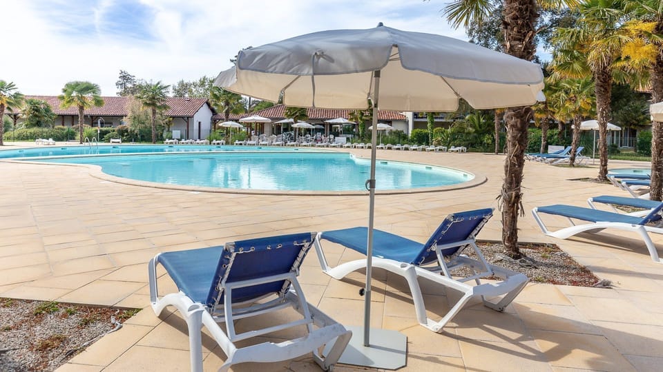 Dive into the outdoor pool on a hot summer day.