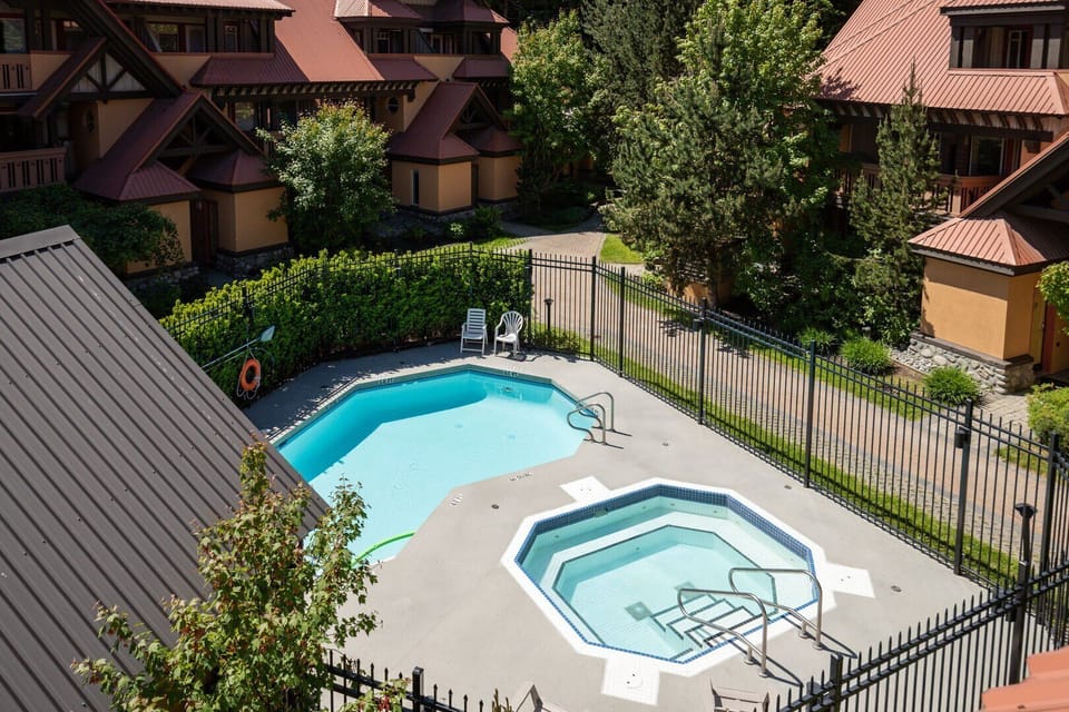 Soothe tired muscles in the shared hot tub after a long day of adventure.