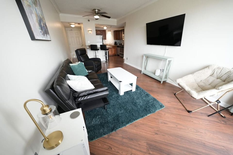 Living room. Full size sleeper sofa. 55” smart TV.