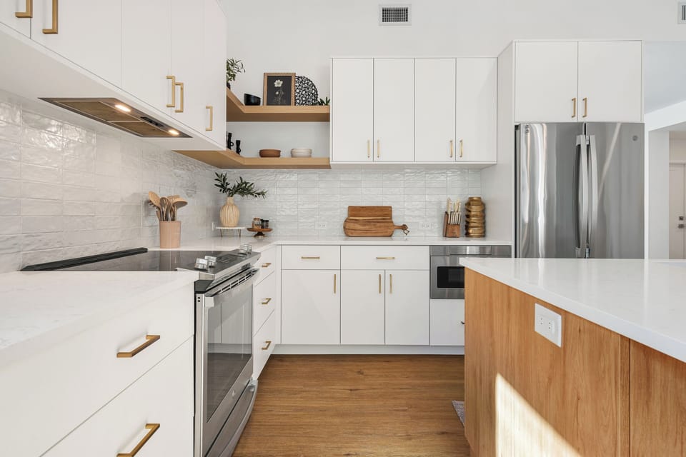 Electric stove top and oven make for a spacious place to make family dinners or little ones help make some fun cookies.