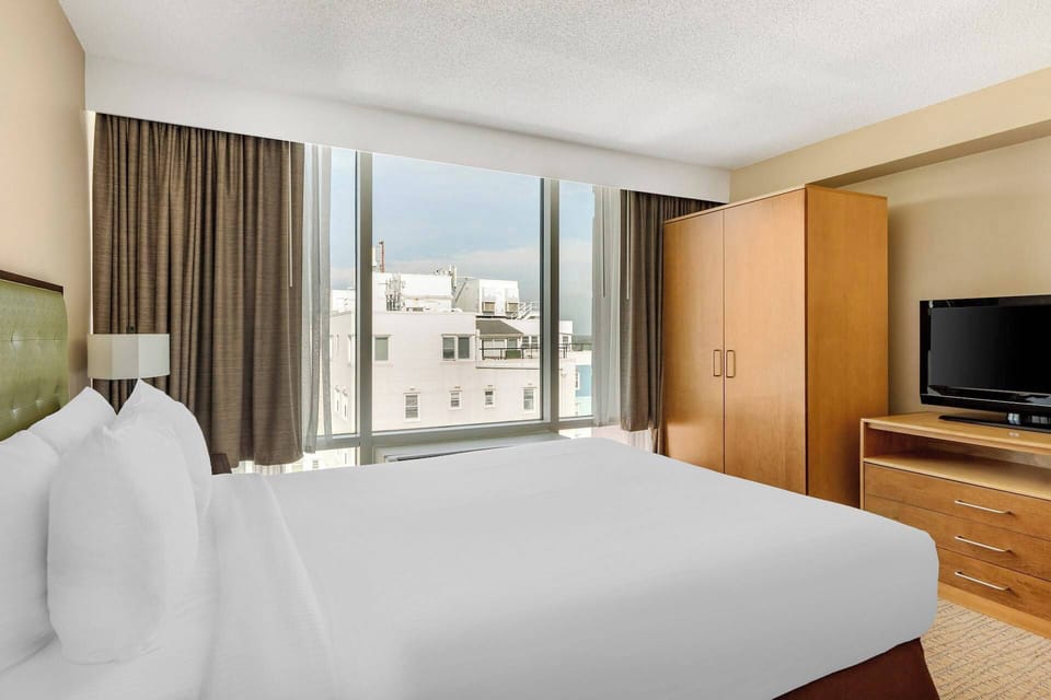 Guest Bedroom features a queen bed.